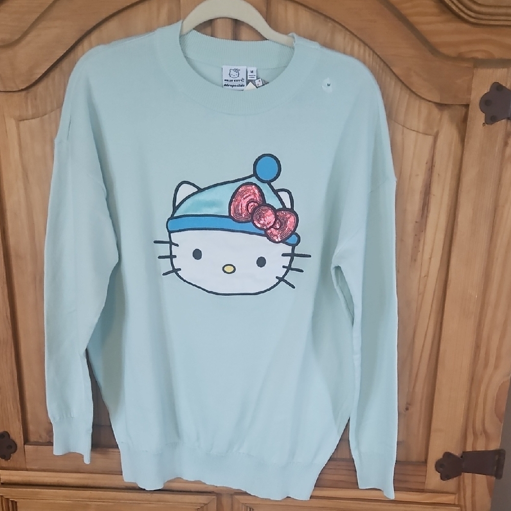 Hello Kitty Mint Sweater with Pink Sequin Bow